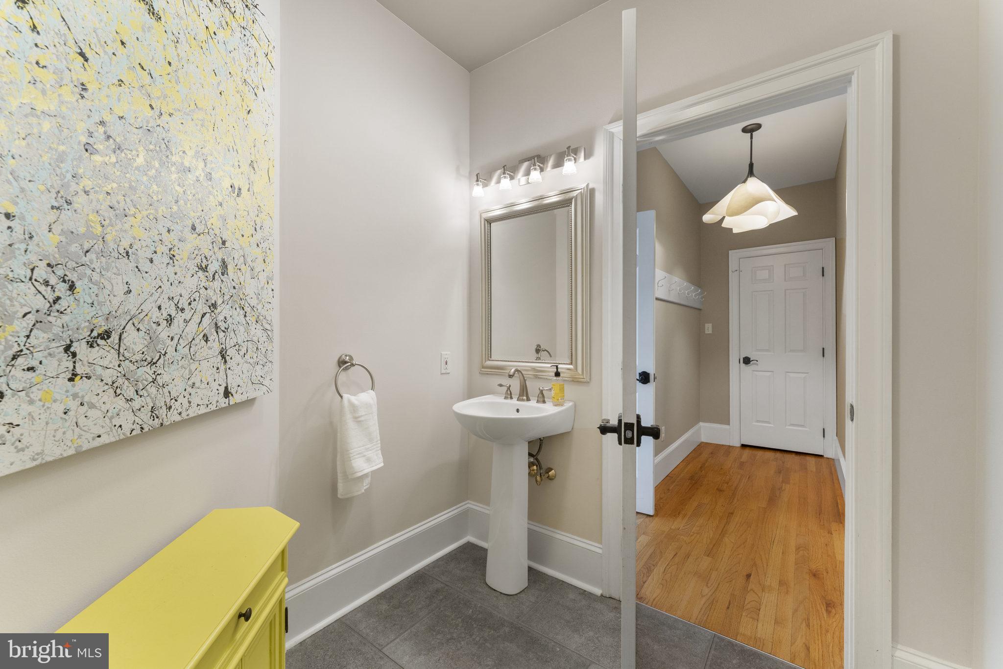 1122 King Of Prussia Road Wayne, PA 19087 - Photo 15 of 33 a bathroom with a toilet sink and mirror