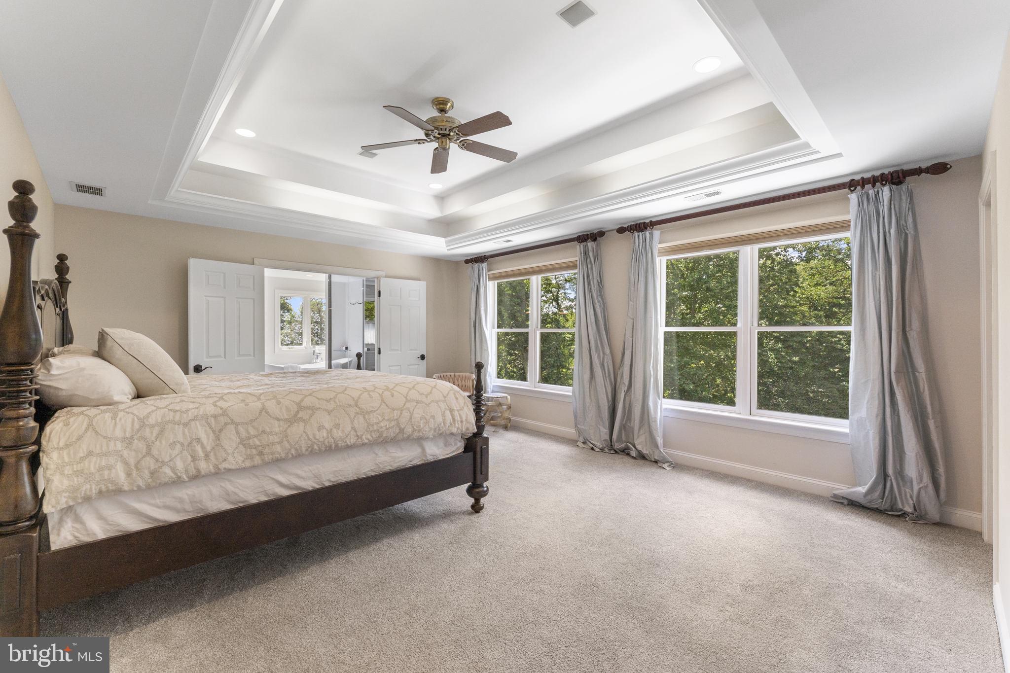 1122 King Of Prussia Road Wayne, PA 19087 - Photo 16 of 33 a spacious bedroom with a large bed and a large window