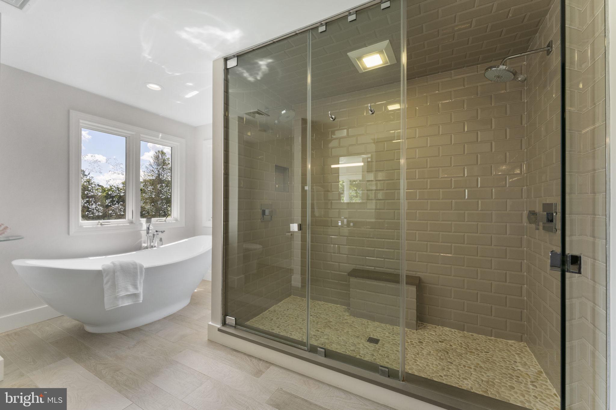 1122 King Of Prussia Road Wayne, PA 19087 - Photo 19 of 33 a bathroom with a shower and a bathtub