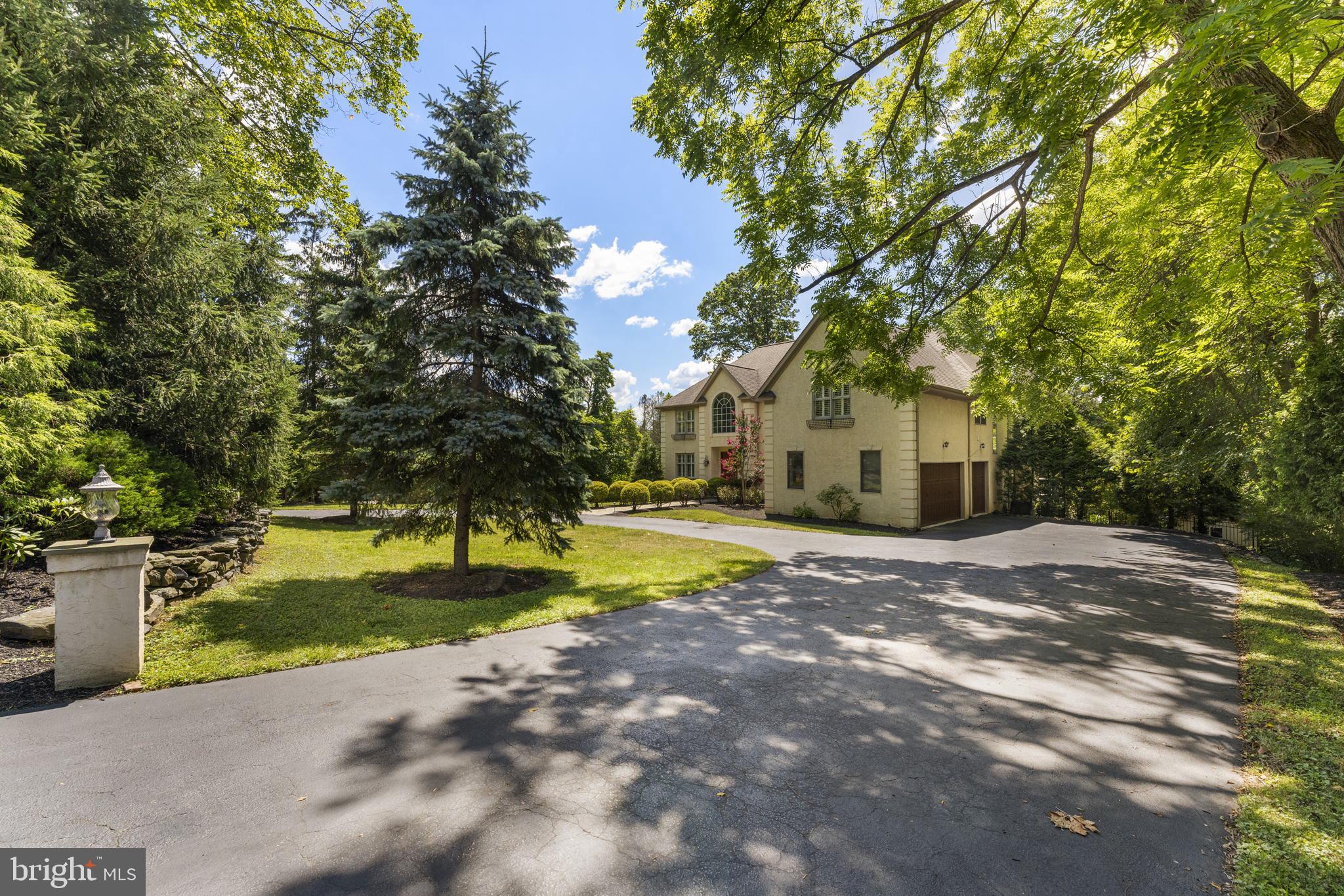 1122 King Of Prussia Road Wayne, PA 19087 - Photo 2 of 33 a view of a house with a yard and large tree