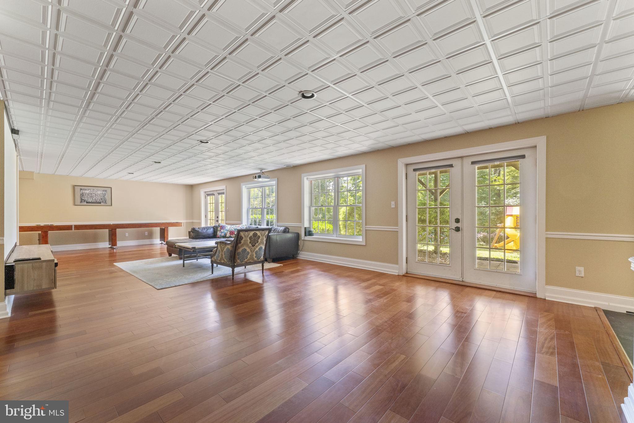 1122 King Of Prussia Road Wayne, PA 19087 - Photo 27 of 33 a living room with furniture and wooden floors