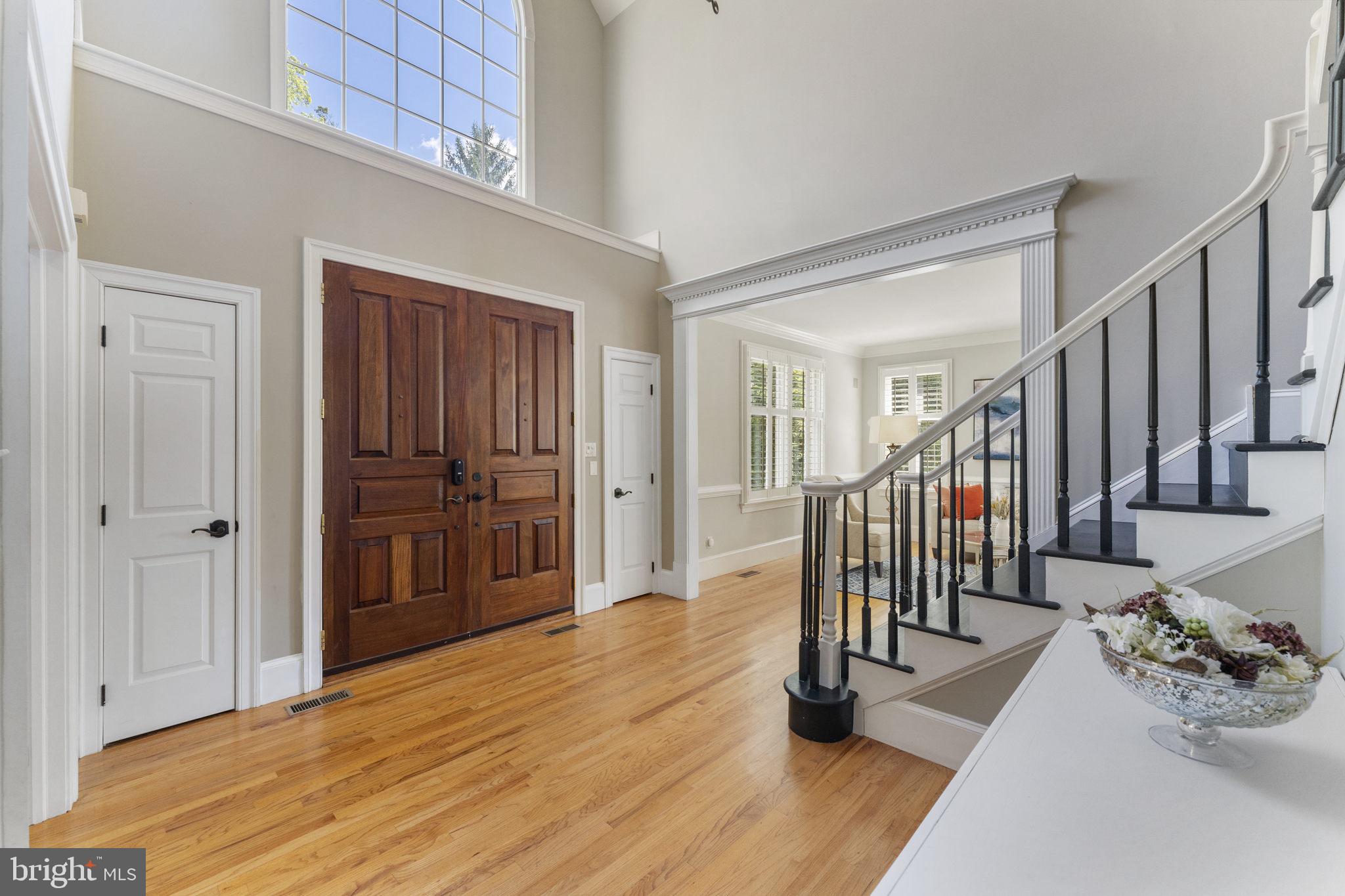 1122 King Of Prussia Road Wayne, PA 19087 - Photo 3 of 33 a view of a hallway with wooden floor and staircase
