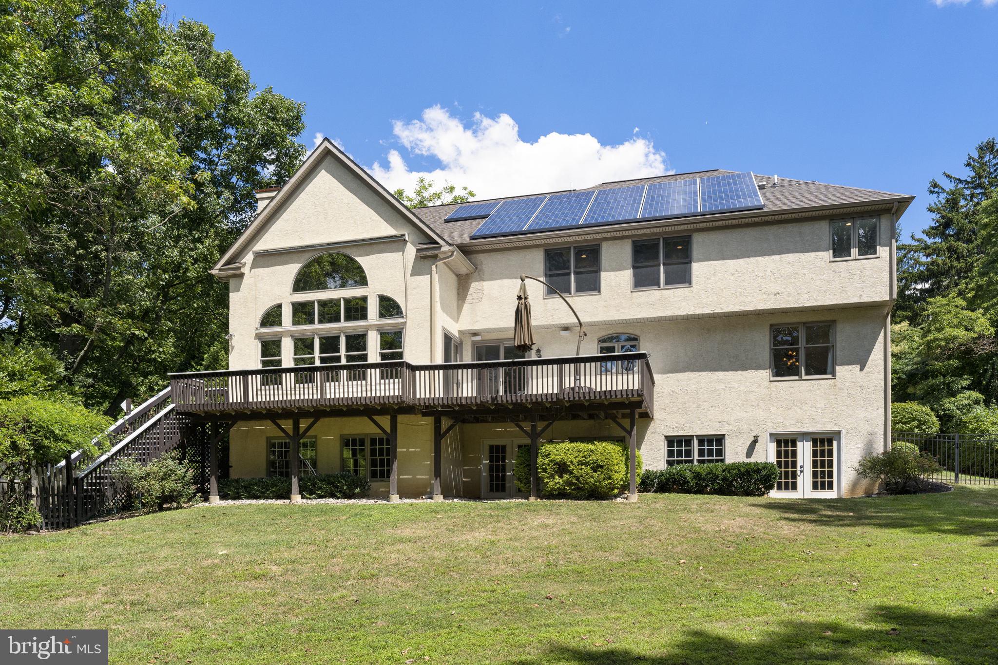 1122 King Of Prussia Road Wayne, PA 19087 - Photo 31 of 33 a view of a white house with a big yard and large trees
