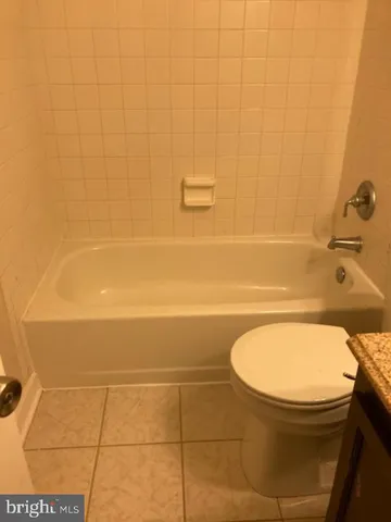 a view of a chandelier fan in a room