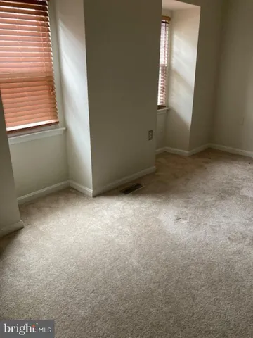 a bathroom with a toilet and a sink