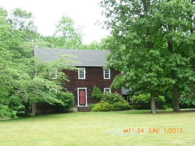 a view of a house with a garden