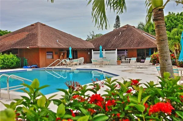 a front view of house with yard and seating area