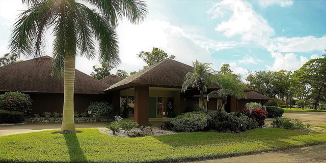 a view of a backyard of the house