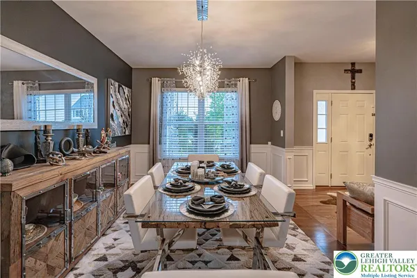 a kitchen with stainless steel appliances granite countertop a sink and a granite counter tops