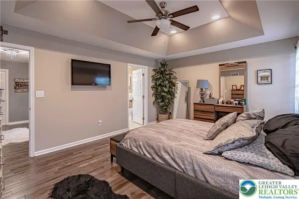 a bedroom with bed and window