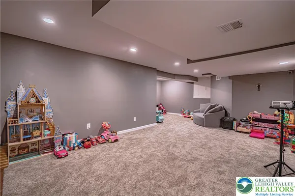 a view of an house with a backyard