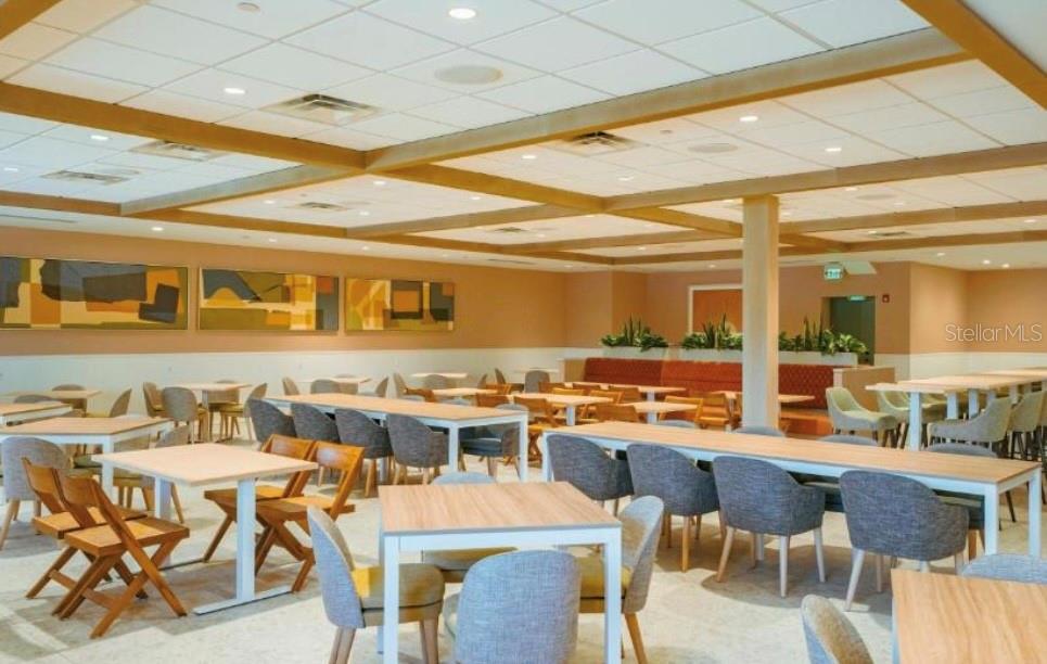 3151 Sunset Walk Drive, Unit 411 Kissimmee, FL 34747 - Photo 21 of 23 a view of a dining room with furniture window and outside view