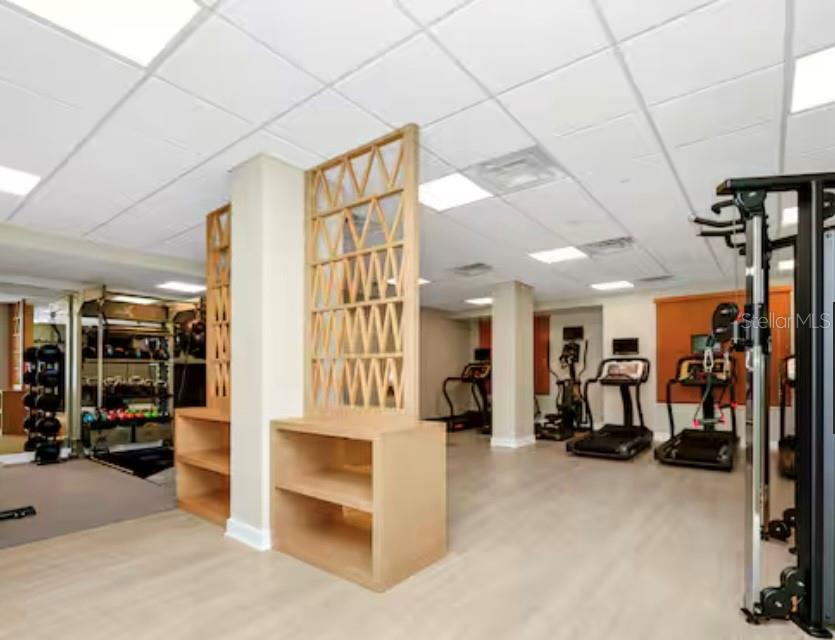 3151 Sunset Walk Drive, Unit 411 Kissimmee, FL 34747 - Photo 23 of 23 a view of a room with gym equipment