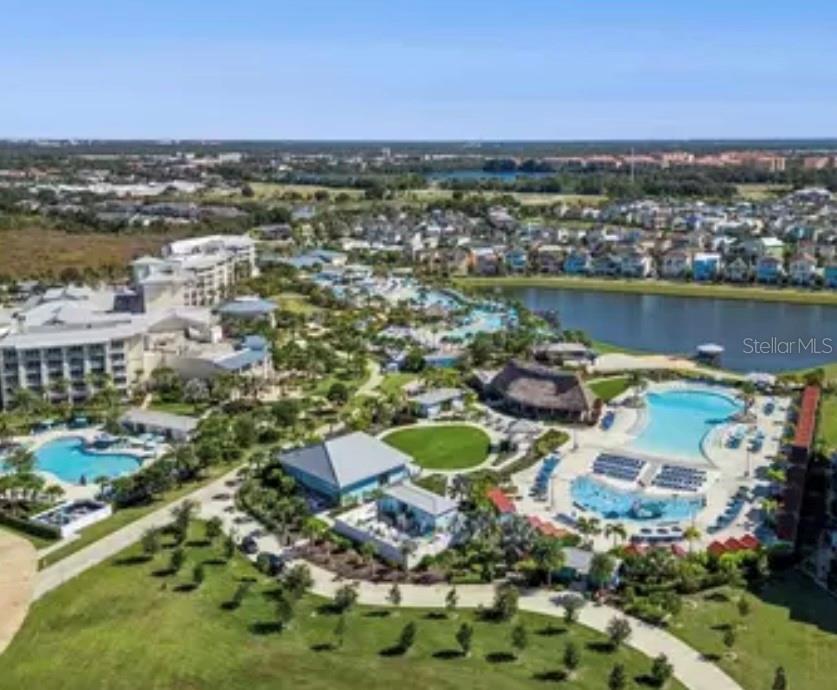 3151 Sunset Walk Drive, Unit 411 Kissimmee, FL 34747 - Photo 4 of 23 a view of a lake with a city