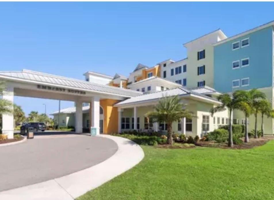 3151 Sunset Walk Drive, Unit 411 Kissimmee, FL 34747 - Photo 7 of 23 a view of outdoor space yard and porch