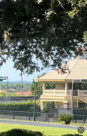 a view of swimming pool with a patio