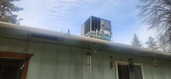 a view of a house with a window and wooden floor