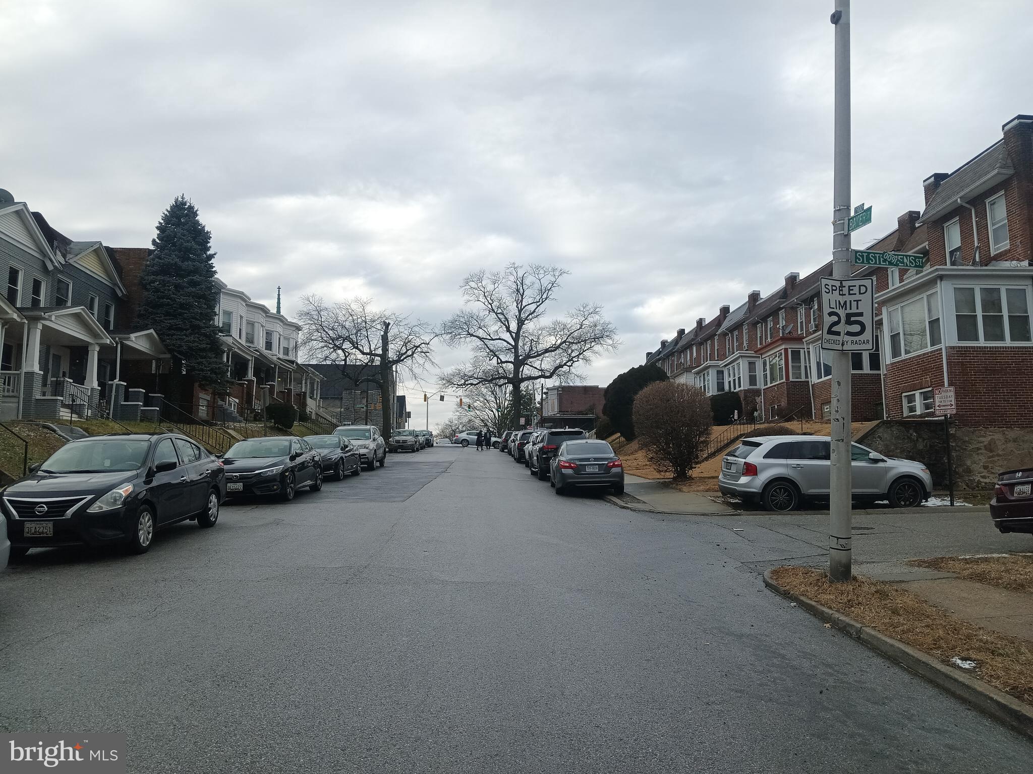 2908 Baker Street Baltimore, MD 21216 - Photo 14 of 15 a view of street with parked cars