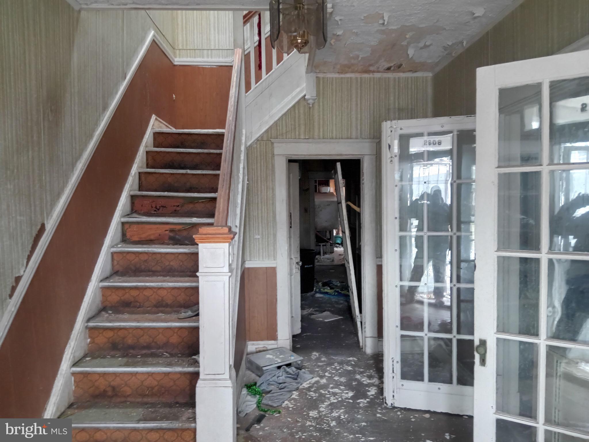 2908 Baker Street Baltimore, MD 21216 - Photo 2 of 15 a view of entryway and hall with wooden floor