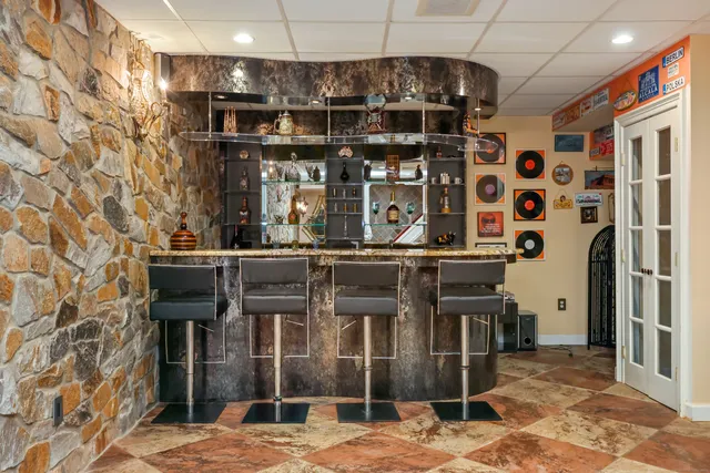 a view of a garage with parked cars