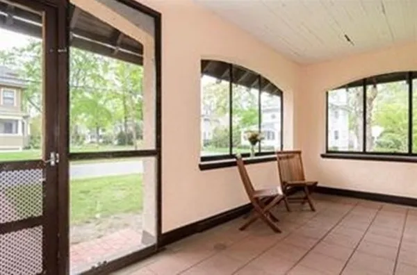 a view of a room with a large window