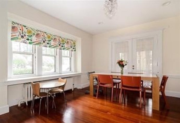 19 Homestead Road, Unit 1 Wellesley, MA 02482 - Photo 10 of 32 a view of a dining room with furniture window and wooden floor
