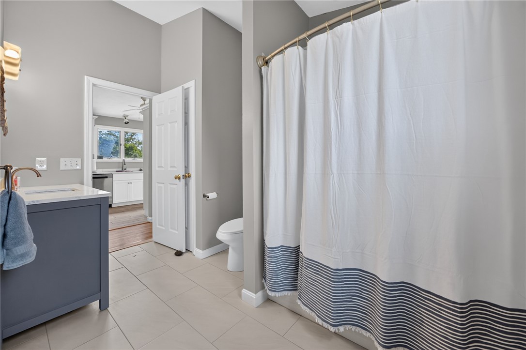 8 SW Road Narragansett, RI 02882 - Photo 15 of 42 Top Level Bathroom with Access to Bedroom 1