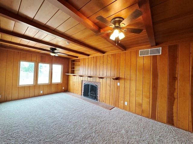 1001 North 3rd Street Lamesa, TX 79331 - Photo 10 of 32 a view of an empty room with a fireplace and a chandelier