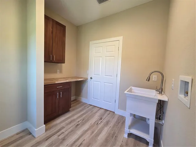a view of a bathroom from the hallway