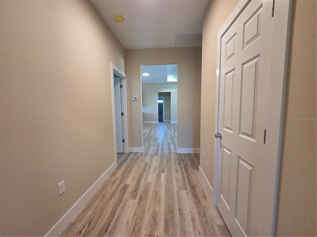8005 North Terrel Point Citrus Springs, FL 34434 - Photo 13 of 41 a view of a room with wooden floor