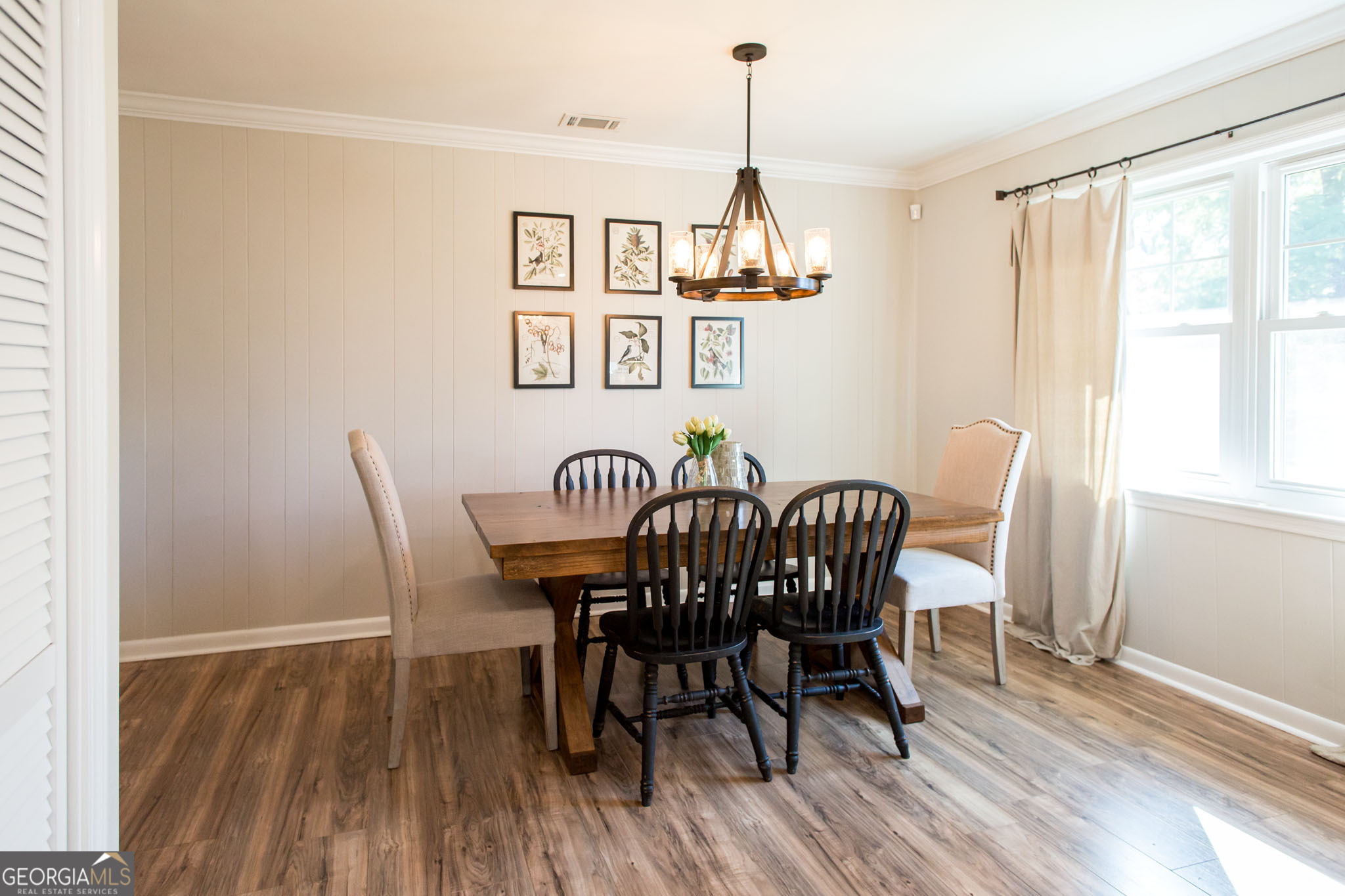 6737 Hacklebarney Road Blackshear, GA 31516 - Photo 14 of 40 a view of a dining room with furniture window and wooden floor