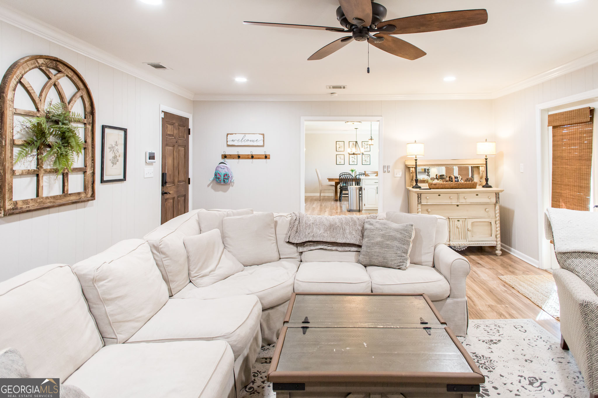 6737 Hacklebarney Road Blackshear, GA 31516 - Photo 16 of 40 a living room with furniture and a large window