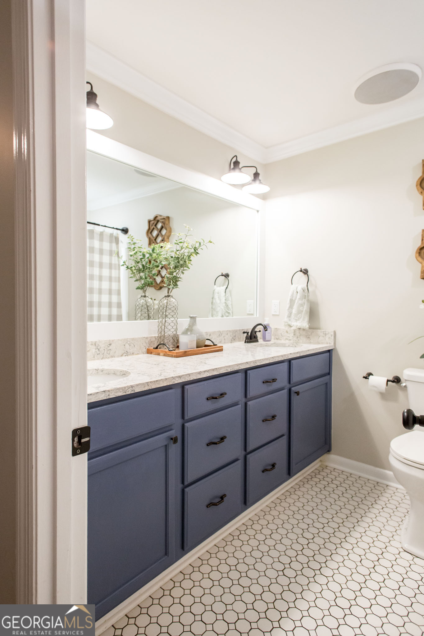 6737 Hacklebarney Road Blackshear, GA 31516 - Photo 22 of 40 a bathroom with a sink and a mirror