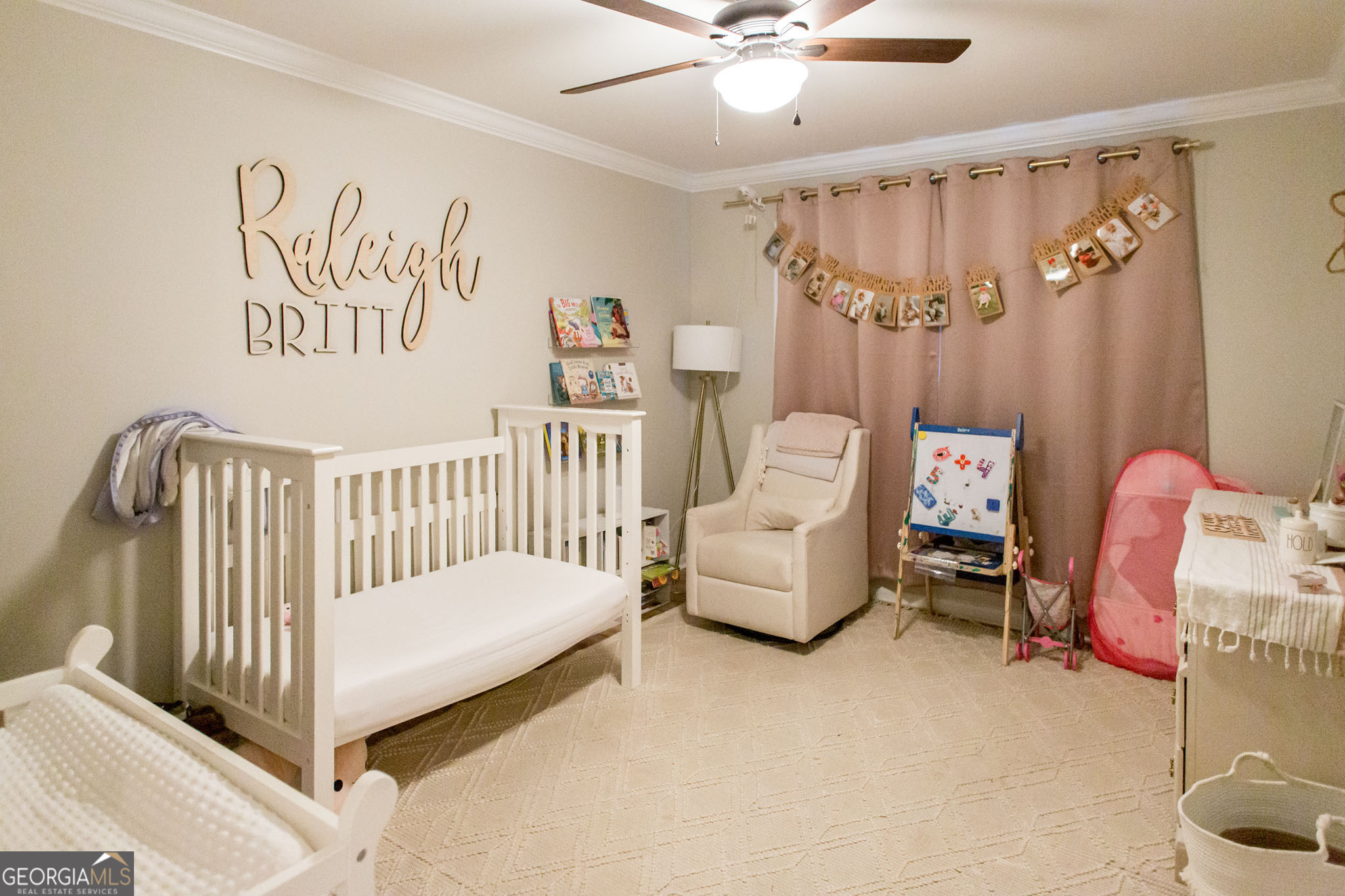 6737 Hacklebarney Road Blackshear, GA 31516 - Photo 26 of 40 a bedroom with a bed and a chair