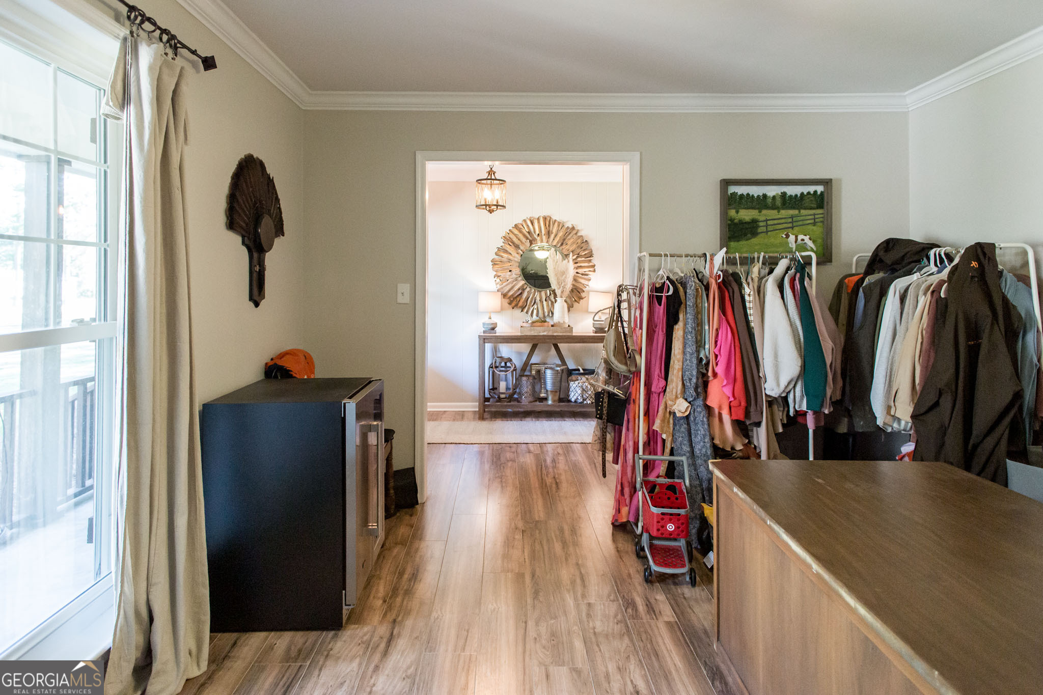 6737 Hacklebarney Road Blackshear, GA 31516 - Photo 32 of 40 a view of walk in closet with clothes and shoes