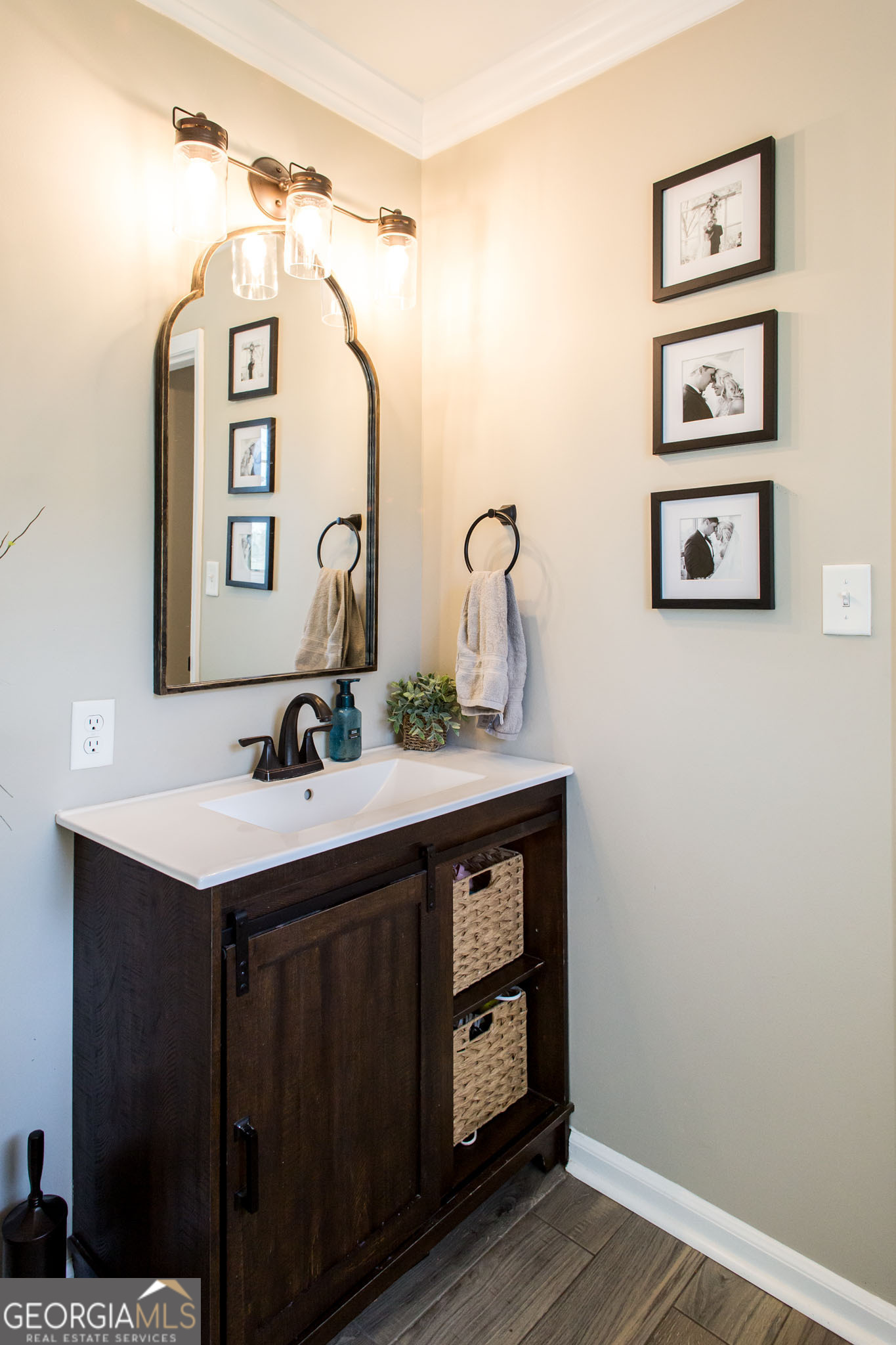 6737 Hacklebarney Road Blackshear, GA 31516 - Photo 34 of 40 a bathroom with a sink and a mirror