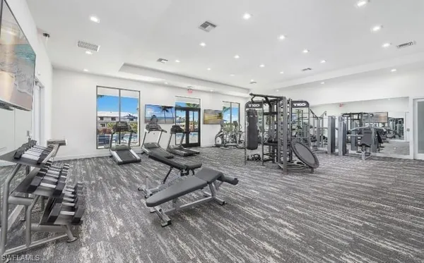 a view of bathroom with sink and mirror