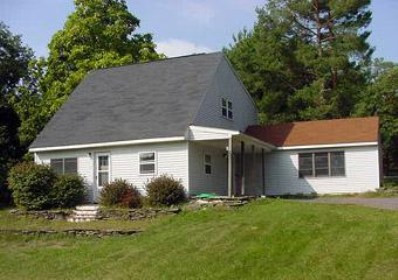 front view of house with a yard
