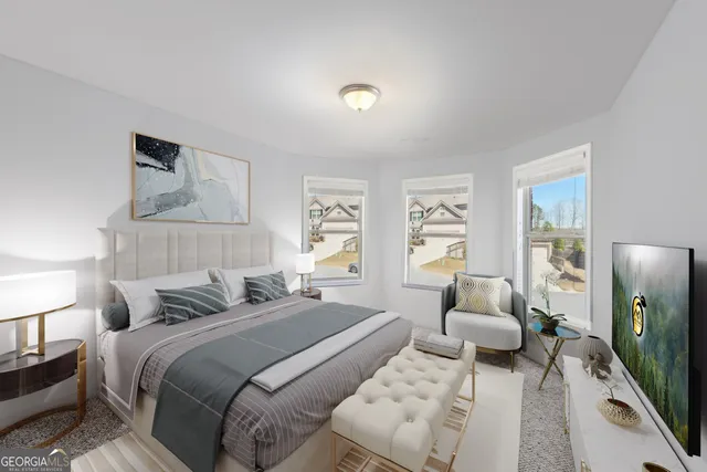 a bedroom with a bed and a large mirror