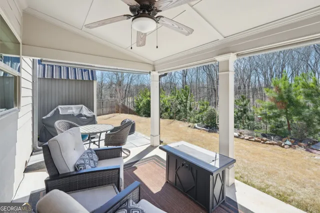 a front view of a house with garden and porch
