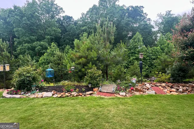 a backyard of a house with lots of green space