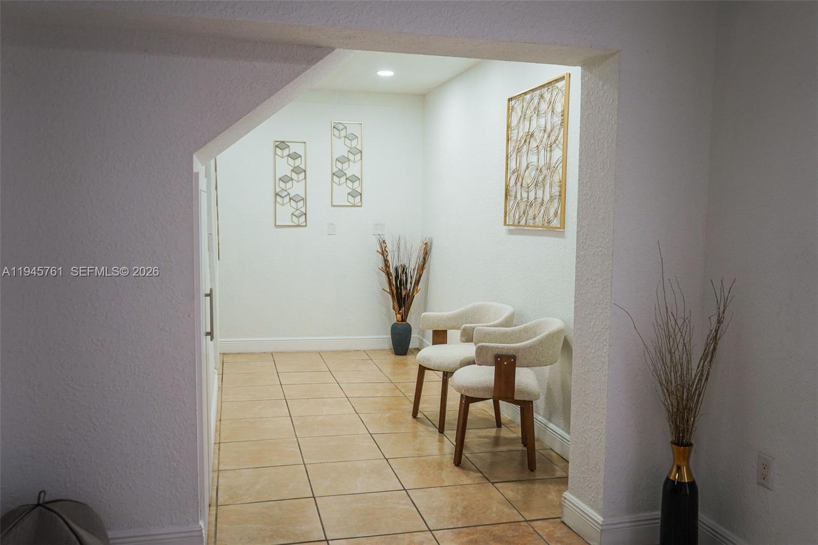 1190 West 33rd Street Hialeah, FL 33012 - Photo 20 of 54 a view of a hallway with chairs