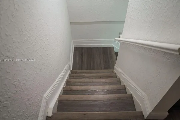 a room with furniture and flat screen tv