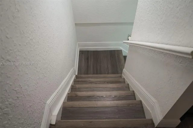 a room with furniture and flat screen tv