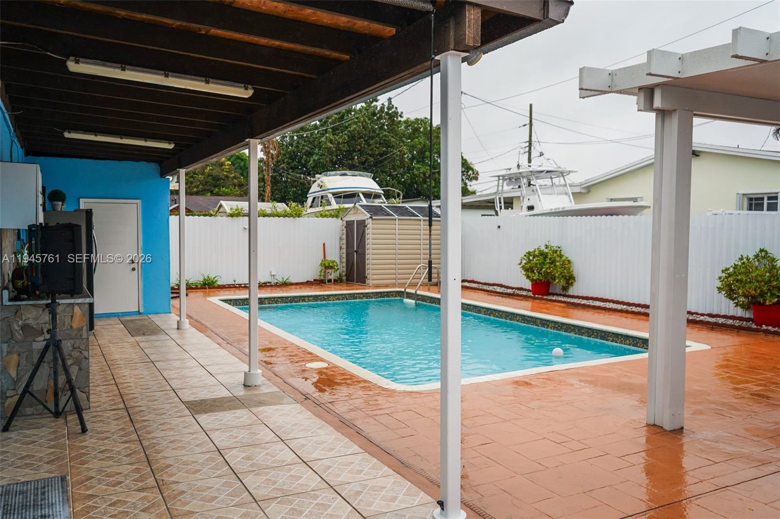 1190 West 33rd Street Hialeah, FL 33012 - Photo 49 of 54 a view of a swimming pool with a patio