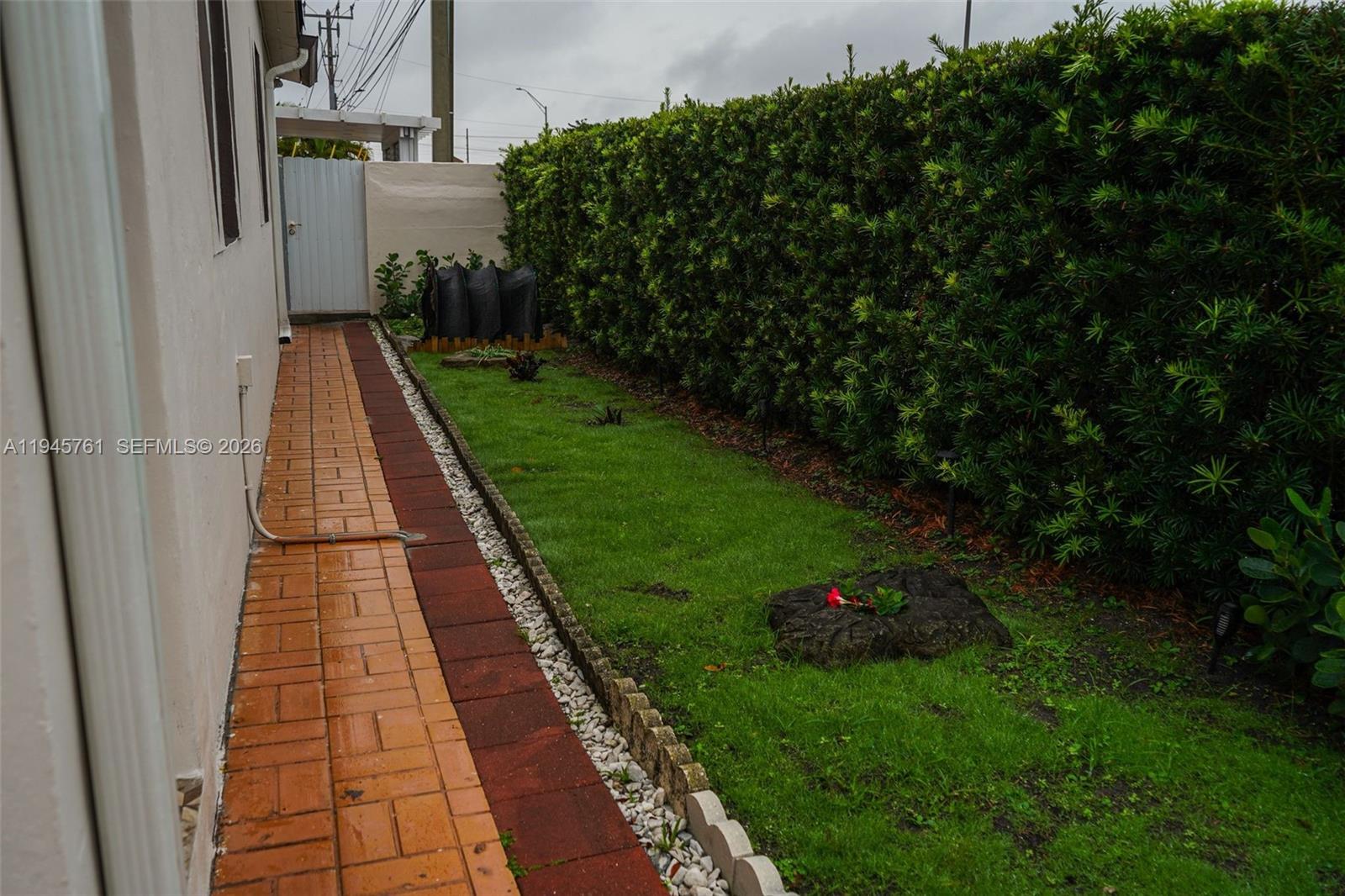 1190 West 33rd Street Hialeah, FL 33012 - Photo 8 of 54 a view of backyard with garden