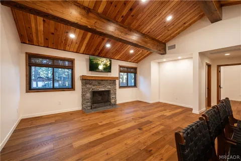 a living room with a fireplace
