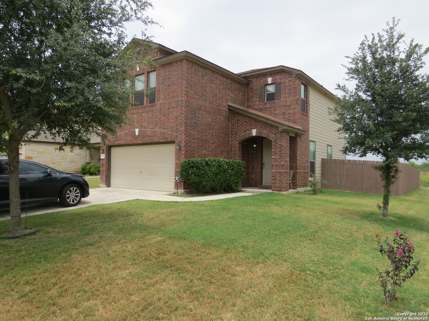 5733 Ty Lindstrom Schertz, TX 78108 - Photo 1 of 1 a front view of a house with a yard and garage