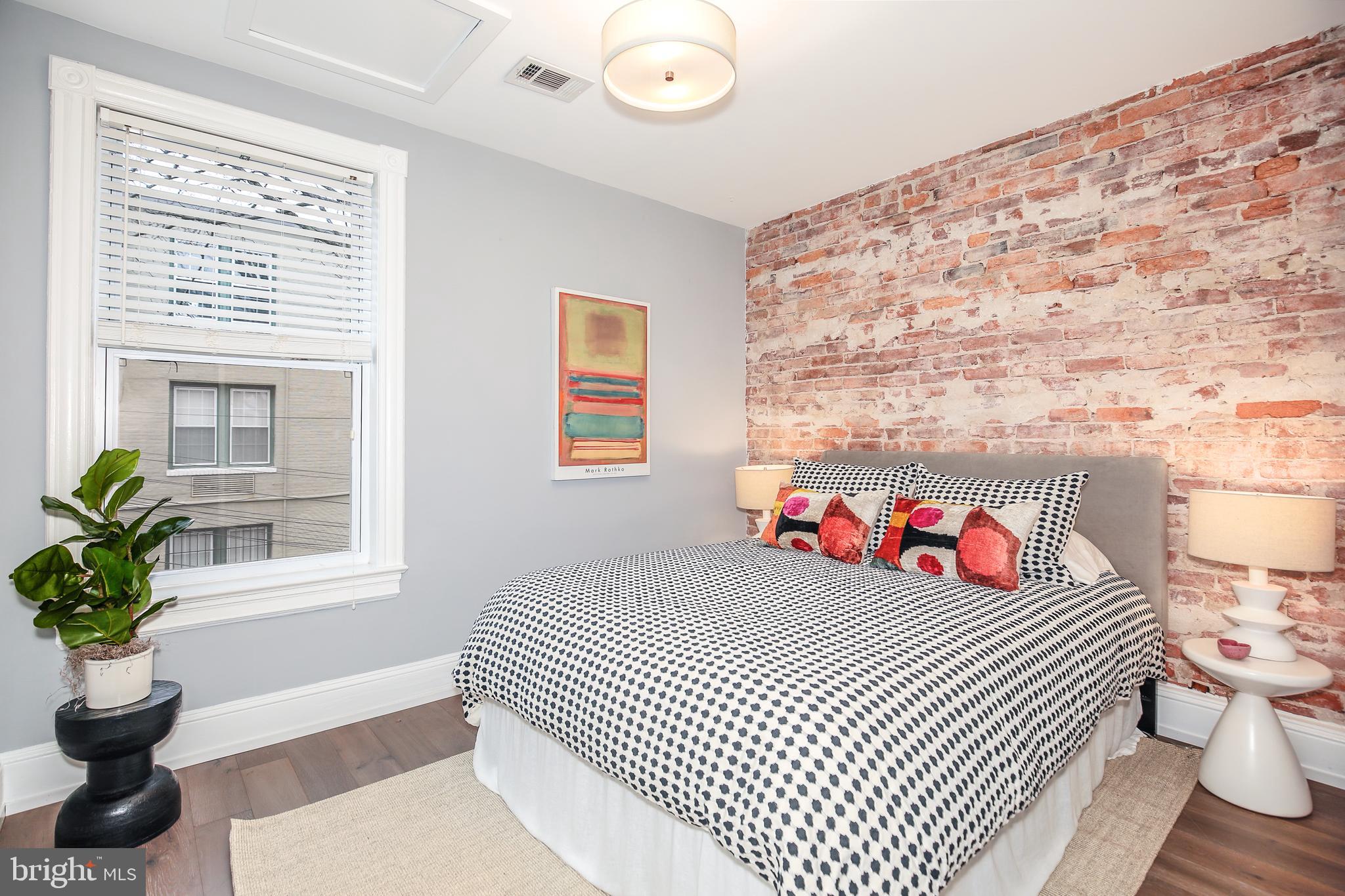 520 12th Street Northeast Washington, DC 20002 - Photo 22 of 37 Bedroom with exposed brick