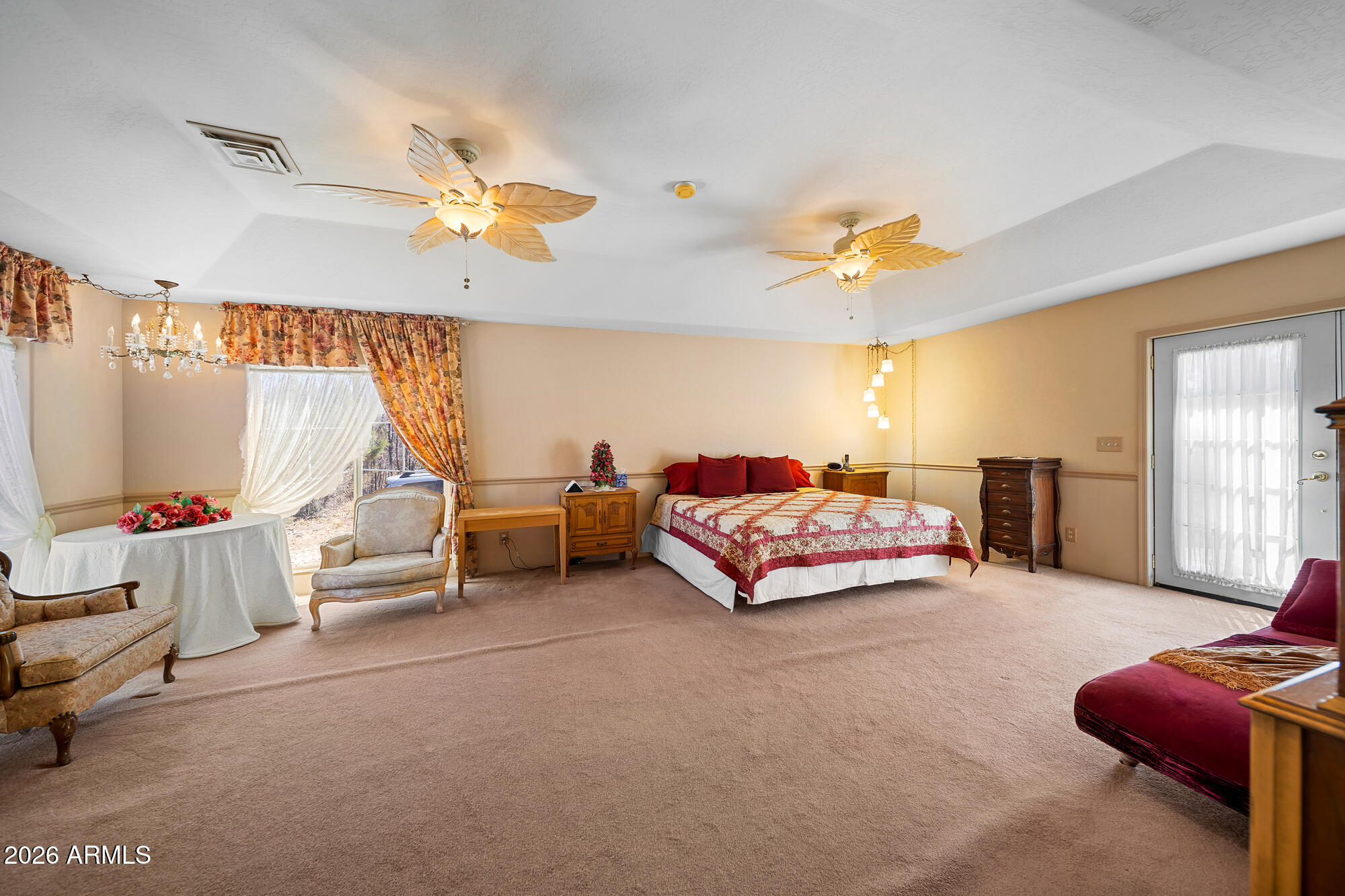 1234 Turkey Hill Road Pinedale, AZ 85934 - Photo 20 of 48 a bedroom with furniture and a chandelier fan